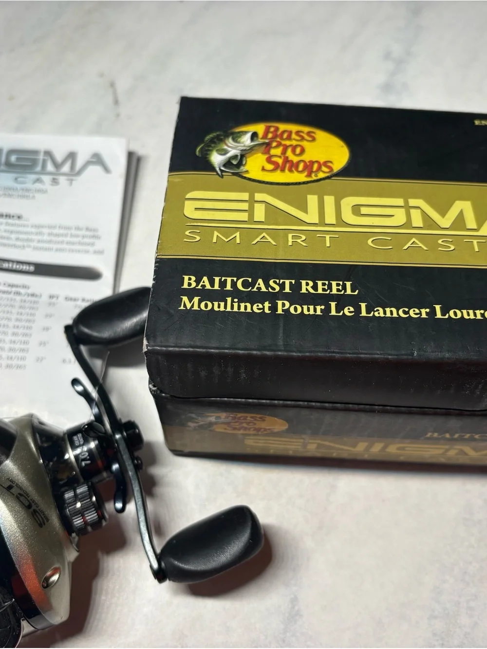 Bass Pro Shops Enigma Smart Cast Reel - Black and Gold - Picture 9 of 10